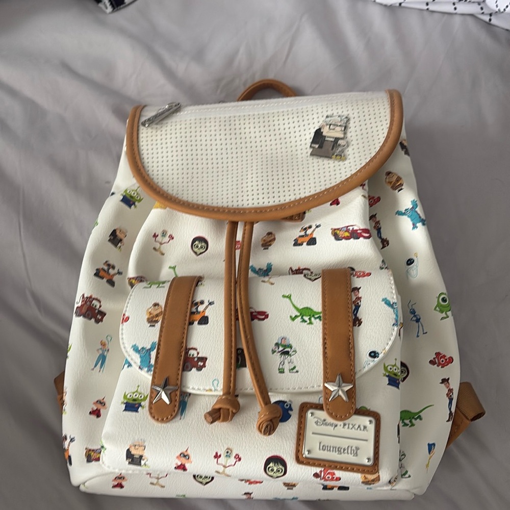 Brand new loungefly Pixar backpack with Carl pin.
